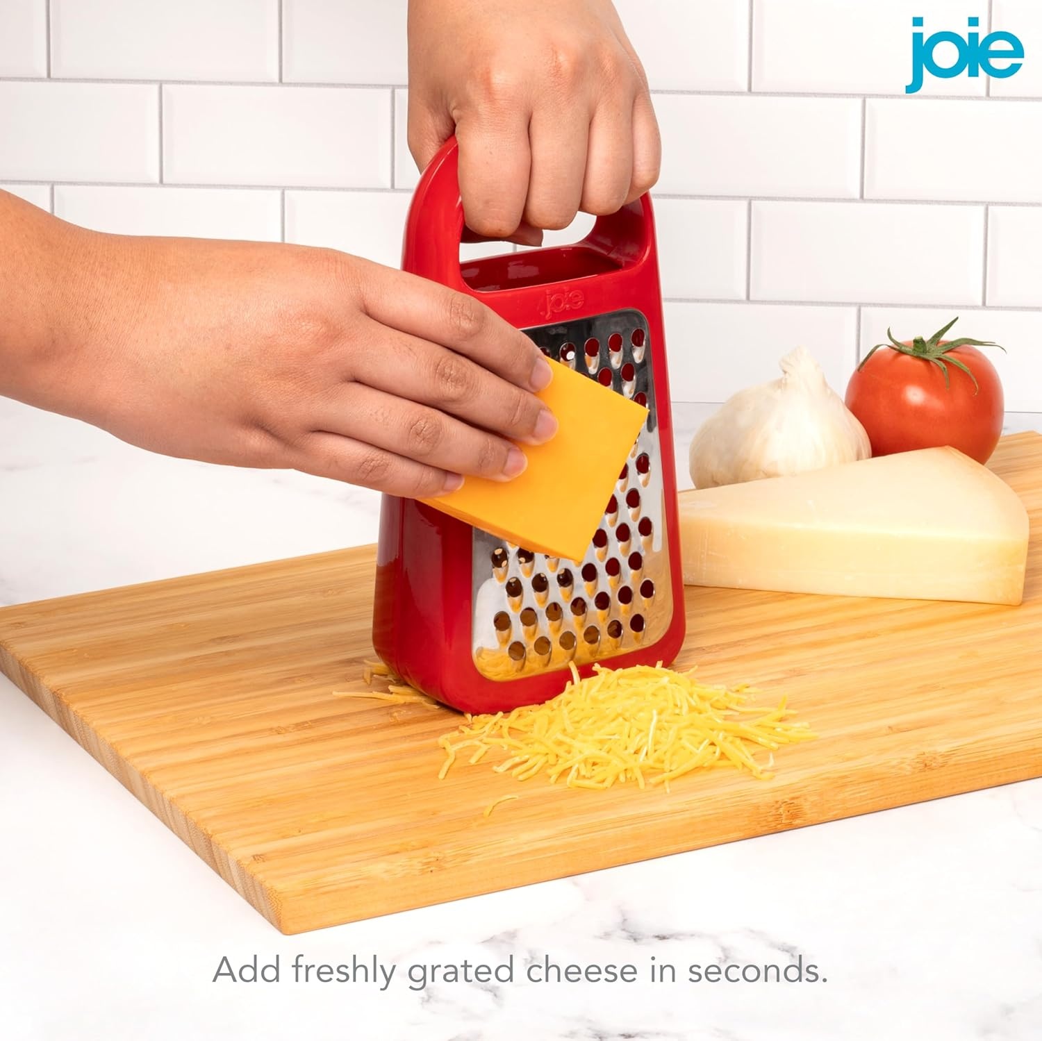 image:imageJoie Hand Grater Compact Shredder with Ergonomic Handle Ideal for Cheese and Vegetables Stainless Steel Great Gift for Home Chefs Colors May VaryTower Grater