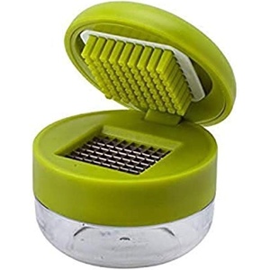image:imageJoie Garlic Press and Chopper with Storage Container Stainless Steel Blades Green Garlic Peeler and Chopper Colors May VaryGarlic Chopper